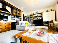 soggiorno con angolo cottura