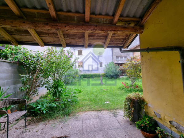 BILOCALE con GIARDINO e BOX