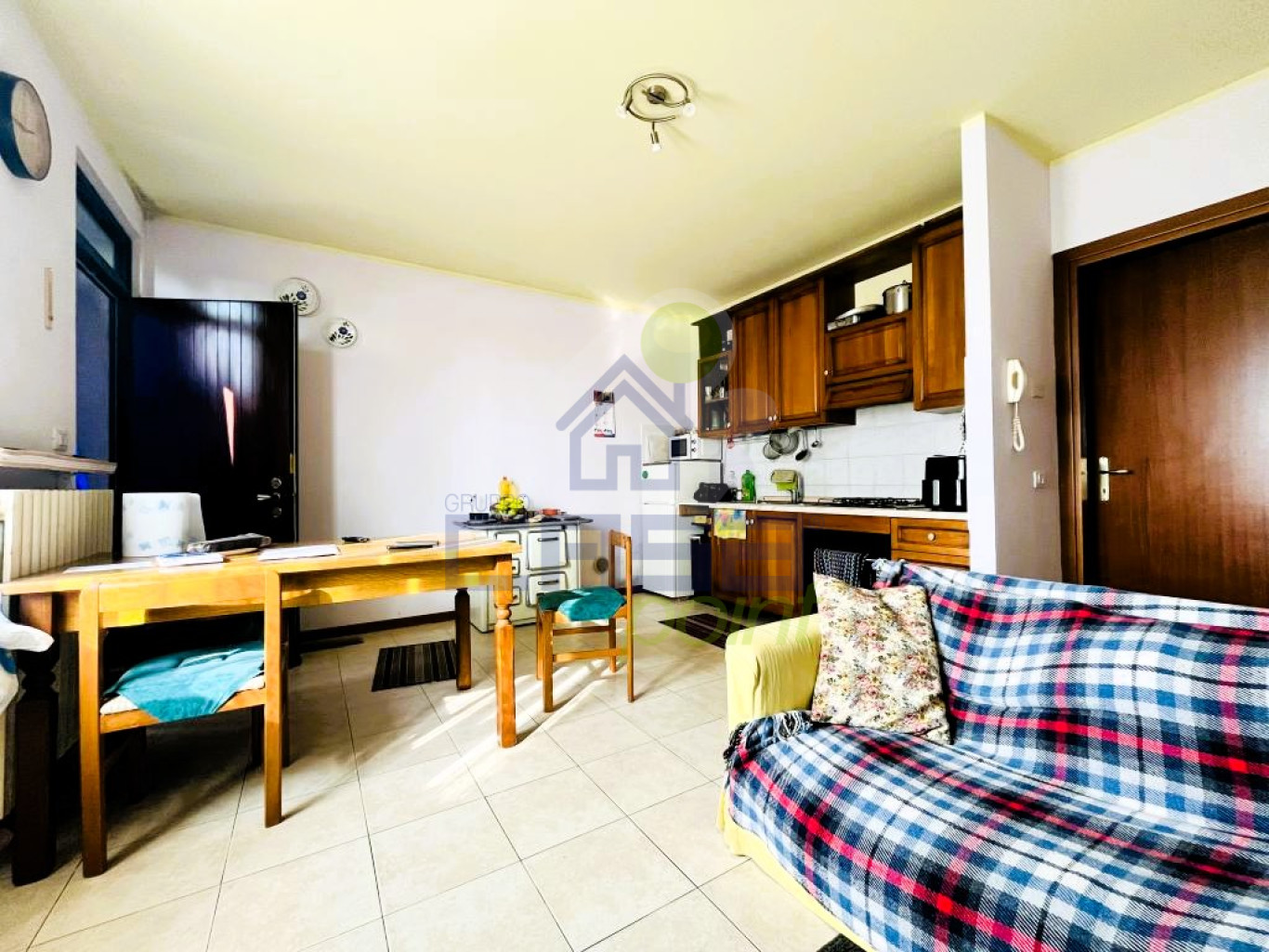 soggiorno con angolo cottura