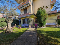 Appartamento di 3 locali con ampio giardino privato e Garage!