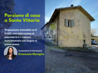 Porzione di casa con giardino in comune e posto auto
