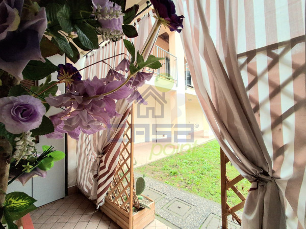 AFFASCINANTE APPARTAMENTO CON GIARDINO PRIVATO E BOX DI 30 MQ