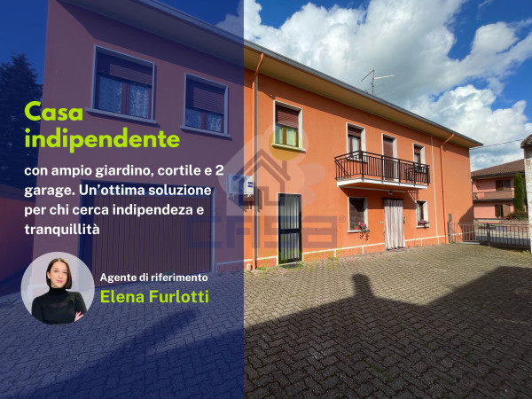 casa indipendente su 3 lati con giardino e 2 garage