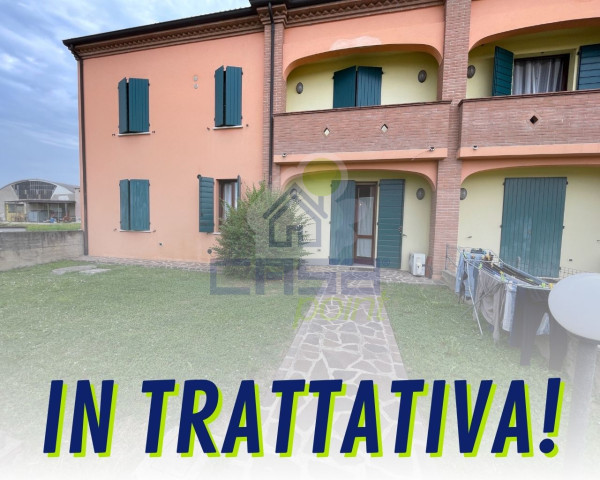 Appartamento al piano terra con giardino e garage. Arredato