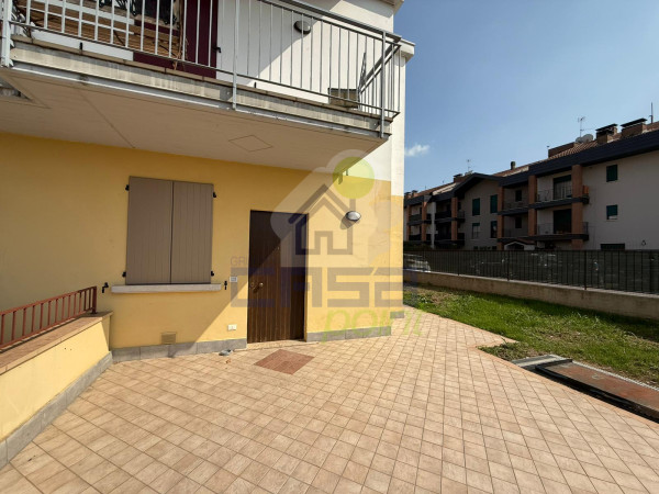 APPARTAMENTO TRILOCALE AL PIANO TERRA CON GIARDINO PRIVATO