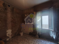 piano terra da ristrutturare ( soggiorno + bagno di servizio) .jpg