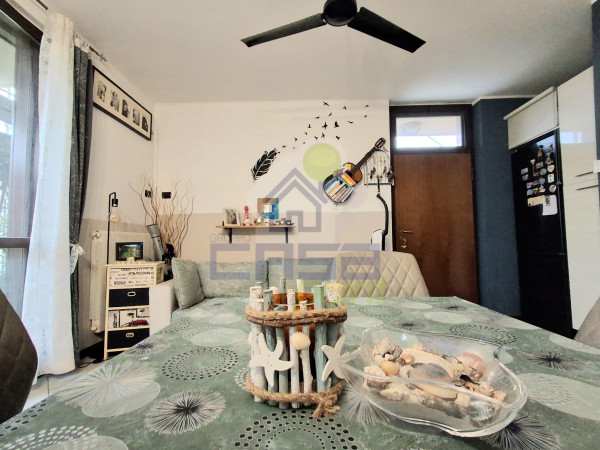 AFFASCINANTE APPARTAMENTO AL PIANO TERRA CON GIARDINO PRIVATO E BOX