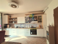 BILOCALE CON GIARDINO PRIVATO