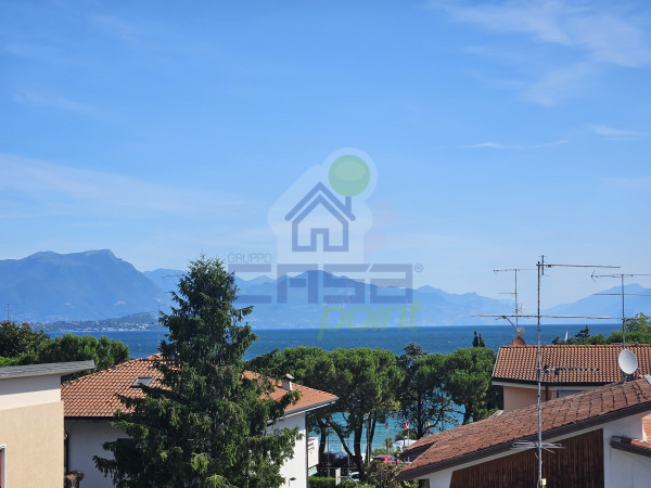 Attico vista lago a Desenzano del Garda